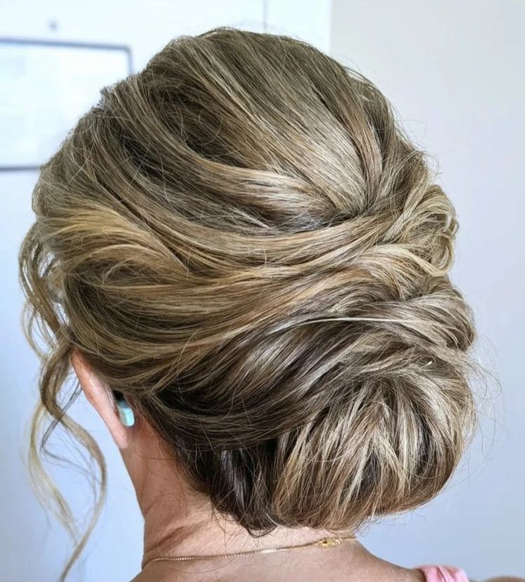 Disheveled Tucked Updo for Mother-of-the-Bride