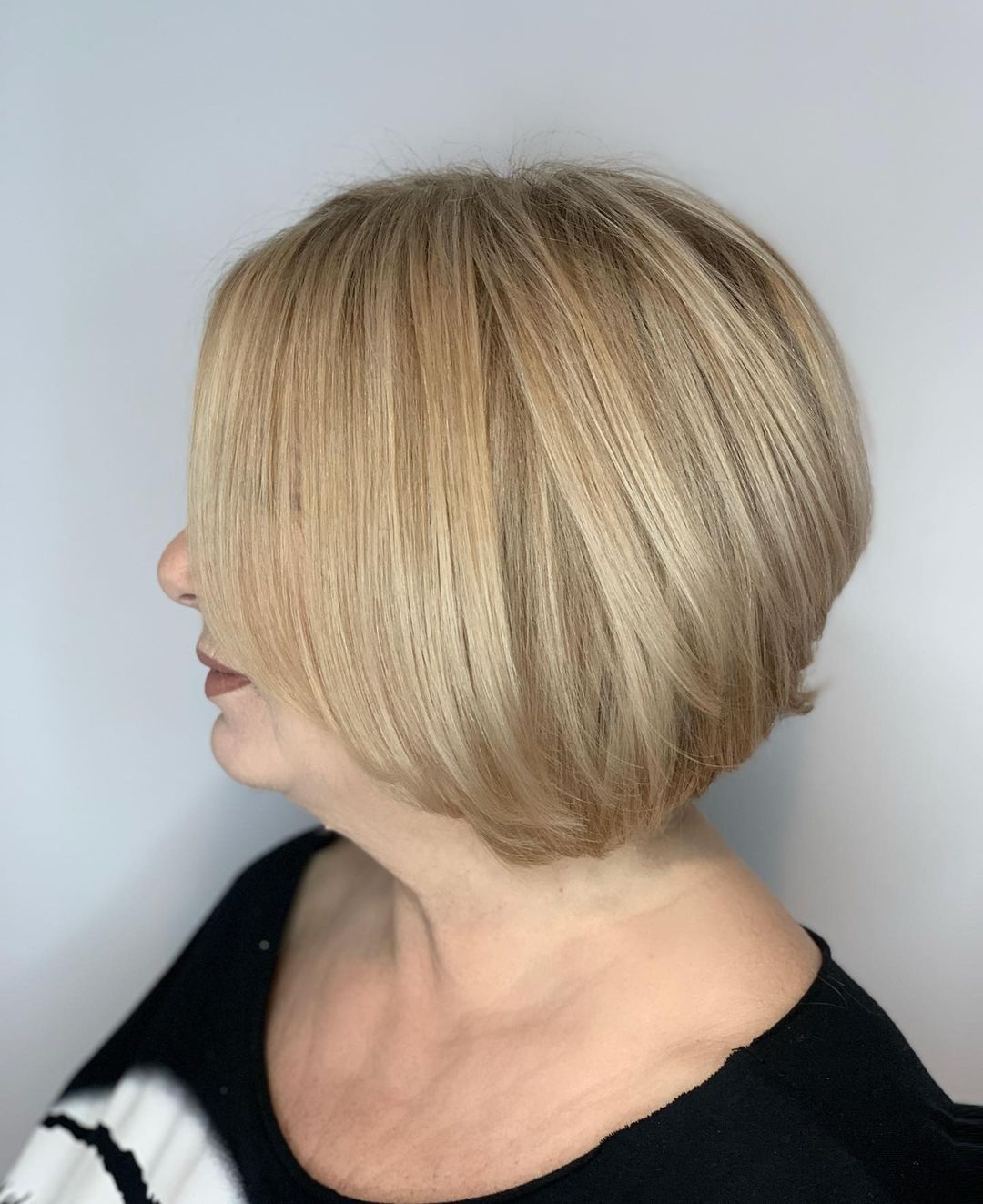 Elegant Warm Blonde Bob Over 60