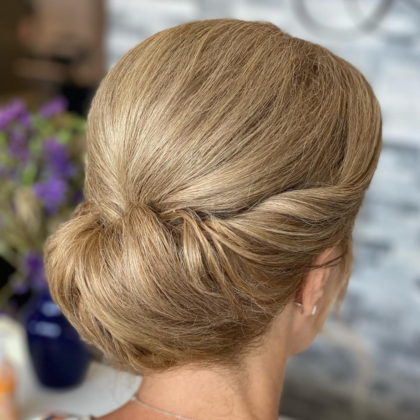 Elegant Mother-of-the-Bride Tuck Updo