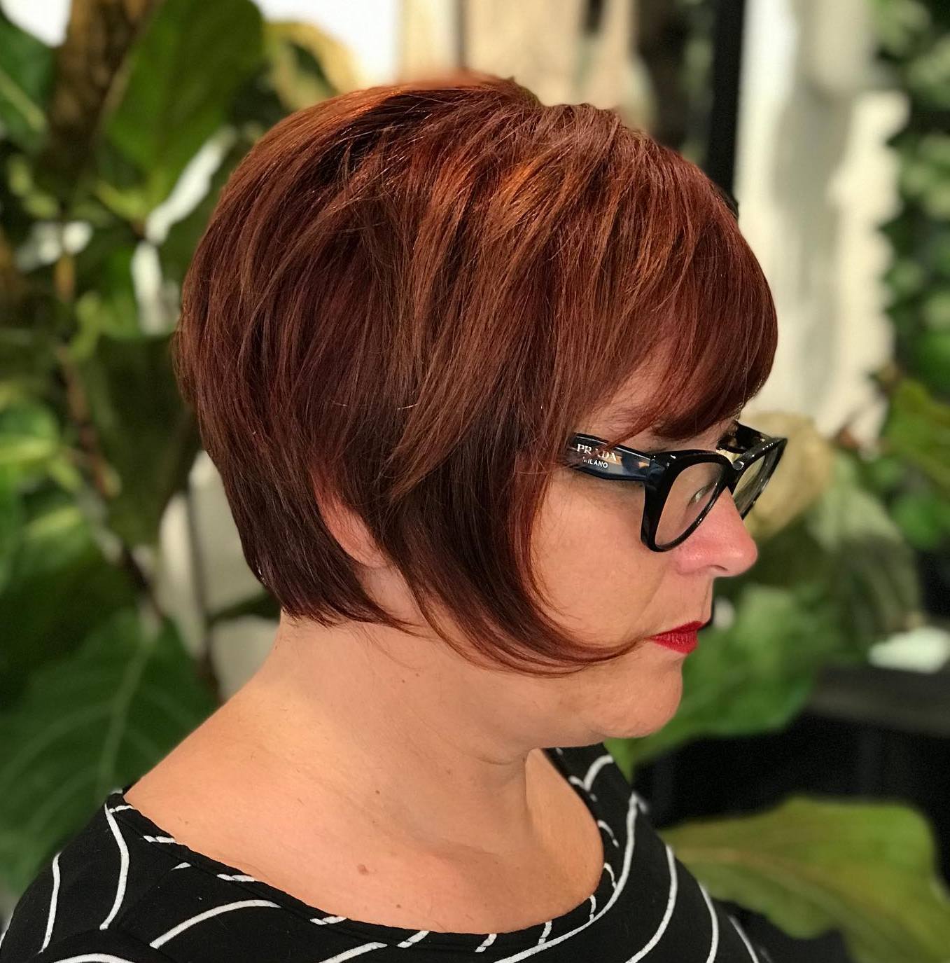 Short Layered Bob with Bangs and Glasses