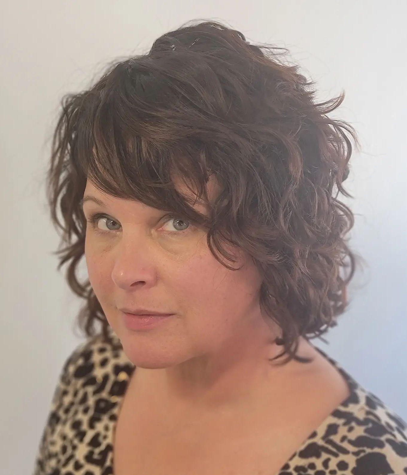 Curly Layered Bob for Round Faces